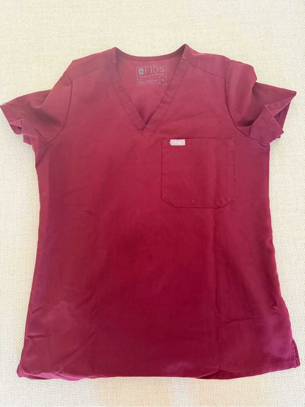 FIGS Women's Catarina V-Neck Scrub Top
 in Burgundy